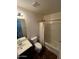 Bathroom featuring a combination tub and shower with sink and toilet at 25862 W North Star Pl, Buckeye, AZ 85326
