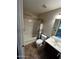 Cozy bathroom with shower-tub combo and wood-style vanity at 25862 W North Star Pl, Buckeye, AZ 85326