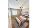 Cozy bedroom featuring a ceiling fan, natural light, and stylish decor for relaxation at 25862 W North Star Pl, Buckeye, AZ 85326