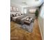 Spacious bedroom featuring a plush bed, soft lighting, and elegant decor for luxurious comfort at 25862 W North Star Pl, Buckeye, AZ 85326
