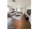 Open-concept living room featuring neutral decor, recessed lighting, and seamless flow at 25862 W North Star Pl, Buckeye, AZ 85326