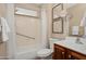 Bathroom with shower/tub combo, toilet, vanity, and neutral wall color scheme at 27581 N 129Th Ln, Peoria, AZ 85383