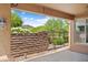 View of covered patio overlooking lush desert landscaping at 27581 N 129Th Ln, Peoria, AZ 85383
