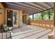 Comfortable outdoor seating on a covered patio perfect for entertaining at 27581 N 129Th Ln, Peoria, AZ 85383
