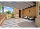 Covered patio with furniture, providing a relaxing outdoor living space at 27581 N 129Th Ln, Peoria, AZ 85383