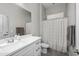 Well-lit bathroom featuring a shower-tub combo, neutral tones, and a single sink vanity at 30639 N Dorado Ct, Queen Creek, AZ 85144