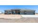 Beautiful single-Gathering home featuring a spacious 3-car garage and a desert landscape in a serene setting at 30639 N Dorado Ct, Queen Creek, AZ 85144