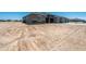 Expansive front yard of new home in desert community, awaiting landscaping to complete its curb appeal at 30639 N Dorado Ct, Queen Creek, AZ 85144