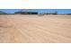 A sprawling dirt lot with residential buildings and a trailer at 30639 N Dorado Ct, Queen Creek, AZ 85144