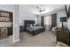 Comfortable main bedroom featuring a king bed and a dry bar with a beverage fridge at 30639 N Dorado Ct, Queen Creek, AZ 85144