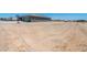 Vast property lot with an attached garage and space for parking and recreational vehicles, ideal for country living at 30639 N Dorado Ct, Queen Creek, AZ 85144