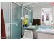 Cozy bathroom with a shower, vanity, and mirror, offering a clean and inviting space at 3107 N 79Th Ave, Phoenix, AZ 85033