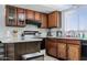Functional kitchen with wooden cabinets, and ample counter space at 3107 N 79Th Ave, Phoenix, AZ 85033