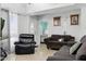 Comfortable living room with modern furnishings, and ample natural light at 3107 N 79Th Ave, Phoenix, AZ 85033