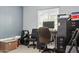 Functional office space with ample storage, desk, and bright window at 3107 N 79Th Ave, Phoenix, AZ 85033