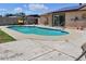 Backyard oasis showcasing a sparkling pool, perfect for summer fun and relaxation at 3107 N 79Th Ave, Phoenix, AZ 85033