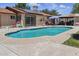 Inviting pool with solar panels on home in a backyard oasis for relaxing and entertaining at 3107 N 79Th Ave, Phoenix, AZ 85033