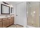 Cozy bathroom with a standing shower and warm toned vanity at 3466 E Bruce Ave, Gilbert, AZ 85234