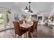 Elegant dining room with seating for six and views of the backyard at 3466 E Bruce Ave, Gilbert, AZ 85234