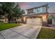Attractive two-story home featuring a large driveway, two-car garage, and well-kept lawn at 3466 E Bruce Ave, Gilbert, AZ 85234