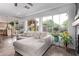 Living room with large windows, couch, and views to the backyard at 3466 E Bruce Ave, Gilbert, AZ 85234