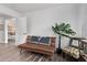 Cozy office area with futon, plant and modern desk, perfect for working from home at 3466 E Bruce Ave, Gilbert, AZ 85234