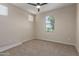 Bedroom featuring neutral walls, carpet flooring and a bright window at 3507 E Alfalfa Dr, Gilbert, AZ 85298