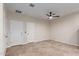 Neutral living space with ceiling fan and tile floors, ideal for relaxing and entertaining at 3507 E Alfalfa Dr, Gilbert, AZ 85298