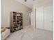 Bright bedroom with a sliding door closet and a wooden bookshelf at 3852 E Bartlett Way, Chandler, AZ 85249