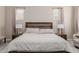 Inviting main bedroom featuring soft lighting, neutral color palette, and comfortable furnishings at 3852 E Bartlett Way, Chandler, AZ 85249