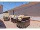 Cozy patio with wicker furniture, perfect for outdoor relaxation at 3852 E Bartlett Way, Chandler, AZ 85249