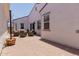 Private patio with brick flooring and stylish outdoor seating at 3852 E Bartlett Way, Chandler, AZ 85249