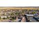 Expansive aerial view of a residential community featuring lush greenery, ample land, and convenient road access at 3927 E Vista Grande --, San Tan Valley, AZ 85140