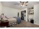 This is a bedroom with carpet, a closet with a full-length mirror, and shelves for storage at 3927 E Vista Grande --, San Tan Valley, AZ 85140