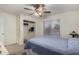 Comfortable bedroom features a ceiling fan, closet, and window for natural light at 3927 E Vista Grande --, San Tan Valley, AZ 85140