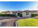 Inviting single-story home featuring a tile roof, well-manicured landscaping, and a circular driveway at 3927 E Vista Grande --, San Tan Valley, AZ 85140