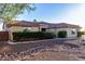 A beautiful single-story home featuring a tile roof, desert landscaping, and a well-maintained front yard at 3927 E Vista Grande --, San Tan Valley, AZ 85140
