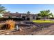 Charming single-story home with desert landscaping, a tile roof, and a three-car garage at 3927 E Vista Grande --, San Tan Valley, AZ 85140