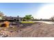 Charming single-story home with desert landscaping, a tile roof, and a three-car garage at 3927 E Vista Grande --, San Tan Valley, AZ 85140