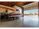 Large garage with a boat and RV, showcasing ample storage and space for recreational vehicles at 3927 E Vista Grande --, San Tan Valley, AZ 85140