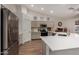 Modern kitchen with stainless steel appliances, white countertops, and gray cabinets at 3927 E Vista Grande --, San Tan Valley, AZ 85140
