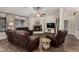 Inviting living room features a fireplace, plush seating, and ample natural light for a warm atmosphere at 3927 E Vista Grande --, San Tan Valley, AZ 85140