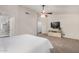 Spacious main bedroom features ceiling fan, sitting area, and en-suite bathroom with tiled shower at 3927 E Vista Grande --, San Tan Valley, AZ 85140