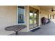 Covered patio with a table and chairs, ceiling fan, and access to the backyard at 3927 E Vista Grande --, San Tan Valley, AZ 85140