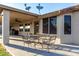 Covered patio with outdoor seating and a ceiling fan at 3927 E Vista Grande --, San Tan Valley, AZ 85140