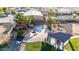 Inviting backyard with a beautiful pool, spa, patio area with gazebo, surrounded by palm trees and lush greenery at 3927 E Vista Grande --, San Tan Valley, AZ 85140