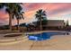 Backyard pool with spa, palm trees and lounge area offers a private and serene outdoor space at 3927 E Vista Grande --, San Tan Valley, AZ 85140