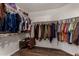 Organized walk-in closet features built-in shelving and hanging rods for ample storage space at 3927 E Vista Grande --, San Tan Valley, AZ 85140