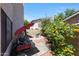 Backyard with seating area, garden area, and barbecue grill at 4210 W Rosemonte Dr, Glendale, AZ 85308