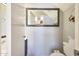Well-lit half-bathroom with a large mirror, neutral walls, and modern fixtures, offering a clean and functional space at 4210 W Rosemonte Dr, Glendale, AZ 85308